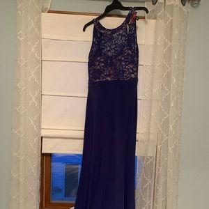Worn only 3 times. Very pretty prom dress